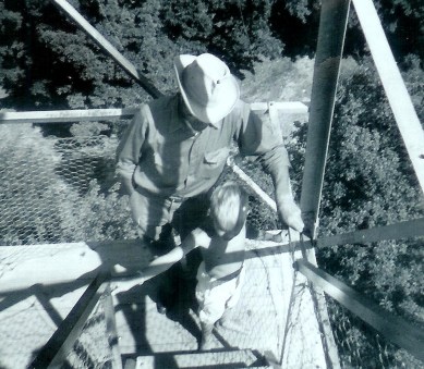 #121=Elliott & Dad on lookout tower, August 1961
