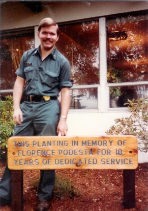 #187=Elliott by refinished sign in front of GHP; circa 1982