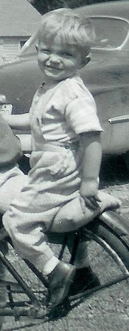 #79.1=Elliott &amp; Rosemary on bike near blue '49 Ford