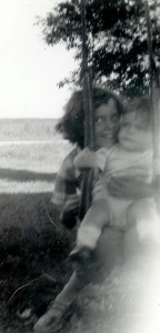 #103=elliott in tree swing with rosemary; aug. 31, 1954