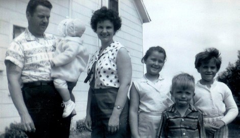 #104=Elliott with Gene Smith family at our farm; 1962 maybe