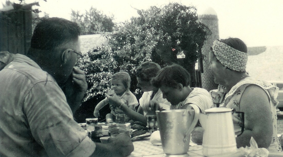#58=Elliott on Ozmun's picnic table, July 7, 1954