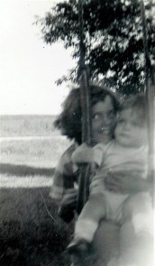 #103.1=Elliott in tree swing with Rosemary; Aug. 31, 1954