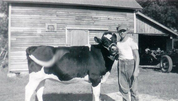 #39=Lowell with cow (circa 1960)