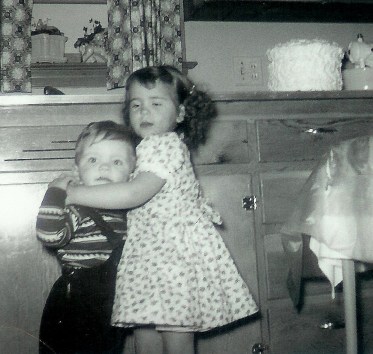 #62=Elliott hugged by Valerie Smith, March 30,1955