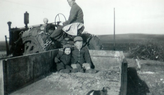 #277=Russ giving Lowell&amp;Rosie ride in wagon; circa 1948