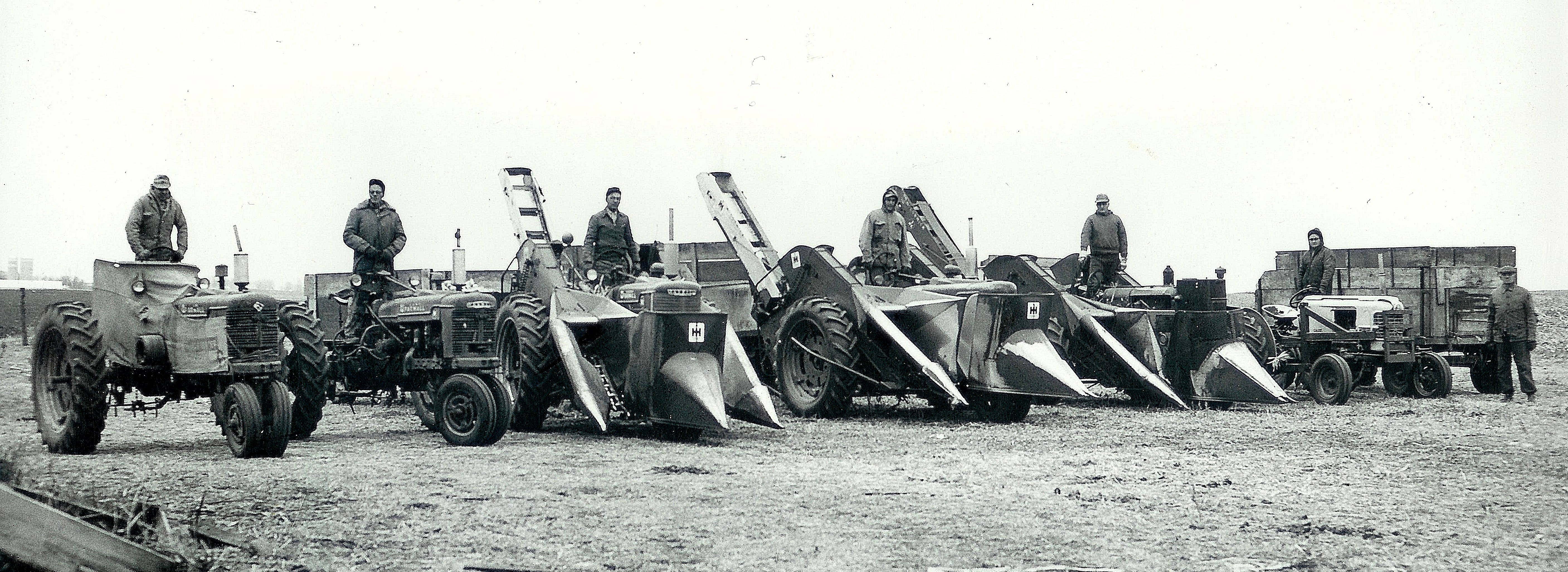 #98=Russell helping harvest corn at Bauman's, 1962