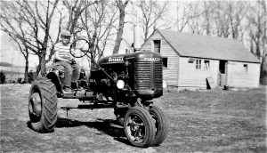 #46=Lowell on B Farmall (April 1954)